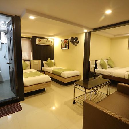 Hotel Happyland Мумбаи Номер фото