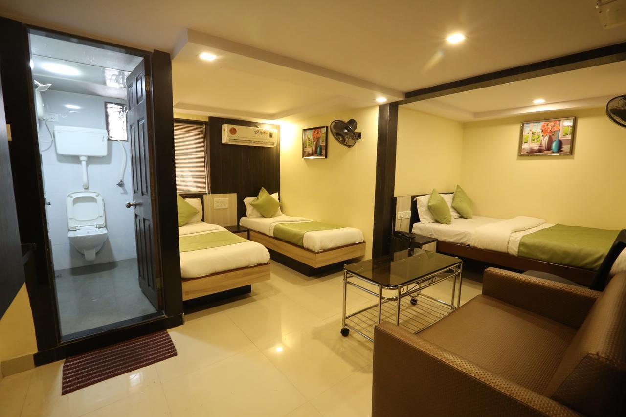 Hotel Happyland Мумбаи Номер фото