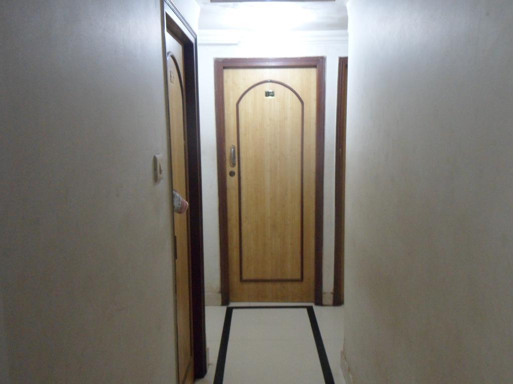 Hotel Happyland Мумбаи Экстерьер фото