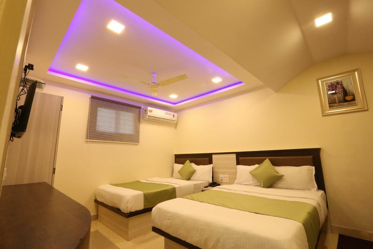 Hotel Happyland Мумбаи Экстерьер фото