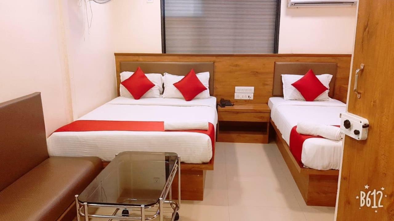Hotel Happyland Мумбаи Экстерьер фото