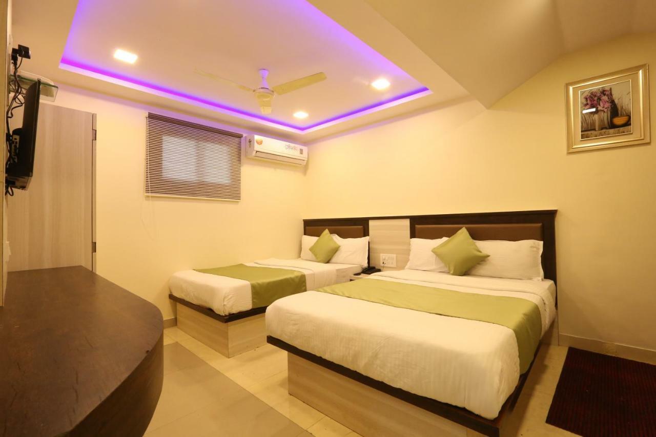 Hotel Happyland Мумбаи Экстерьер фото