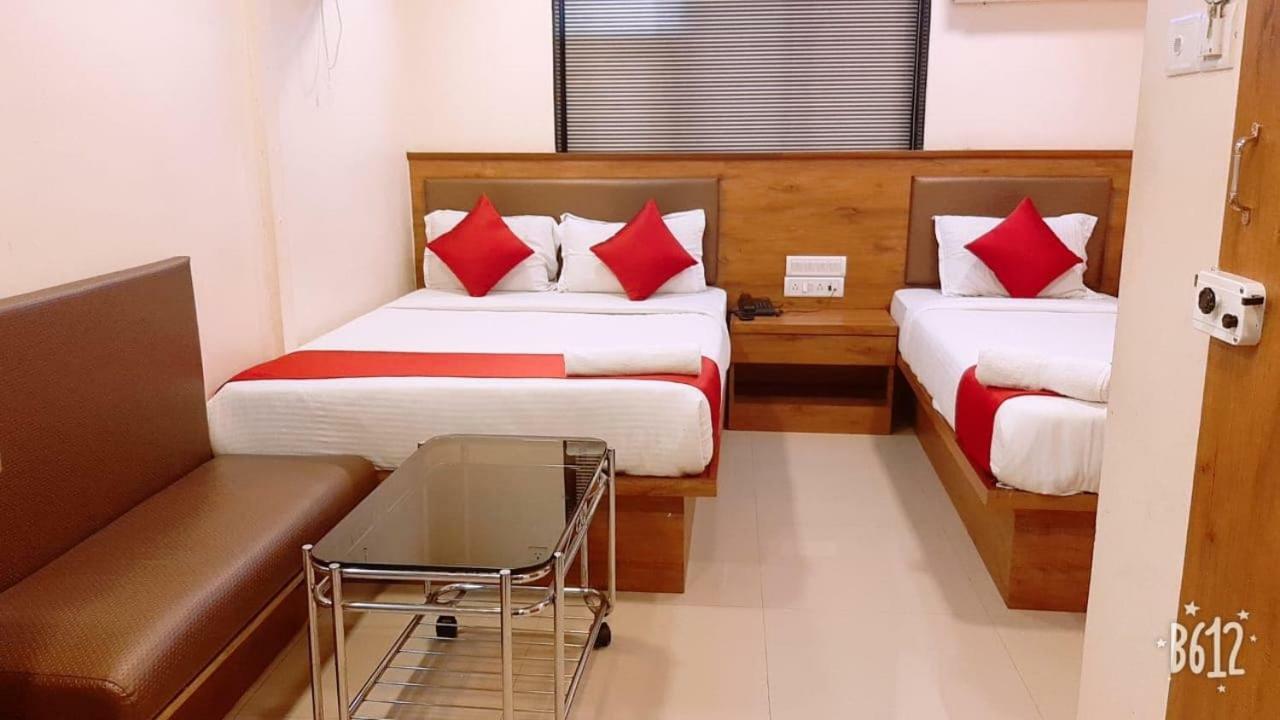 Hotel Happyland Мумбаи Экстерьер фото