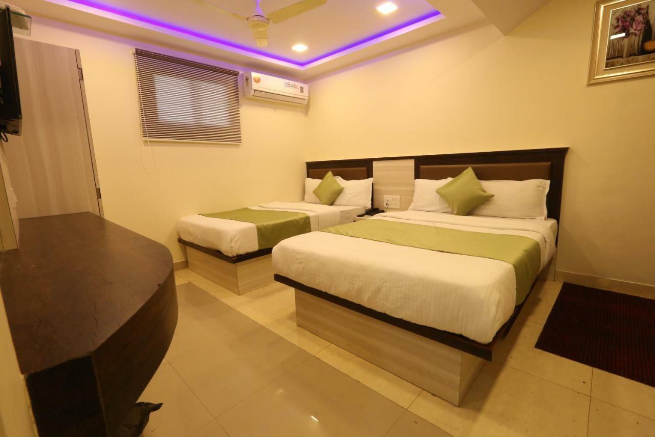 Hotel Happyland Мумбаи Экстерьер фото